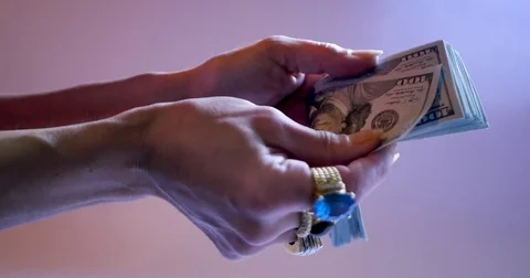 Hands that count dollars Stock Footage 83722317