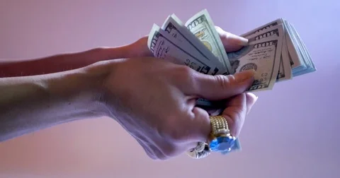 Hands that count dollars Stock Footage 83722322