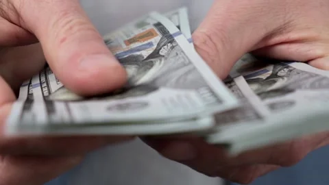 Hands count new printed US dollar bills. business crisis. slow motion. close-up. Stock Footage 187866888