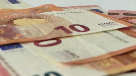 Hands counting 10 euro banknotes, closeup view. Male hands counting a stack.. Video stock 265882070