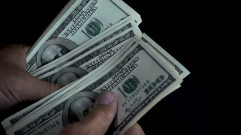 Hands counting dollar bills in slow motion Video stock 143609510