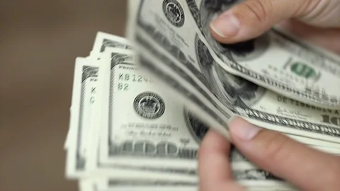 Hands counting dollars Stock Footage 85712070