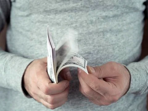 Hands counting dollars 스톡 사진