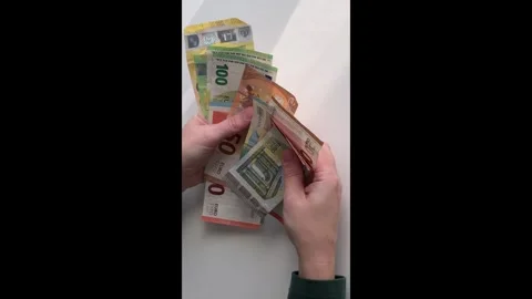 Hands counting euro banknotes on a white table. Stock Footage 324784760