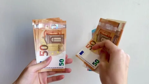 Hands Counting Euro white wall background Vídeos de archivo 287583759