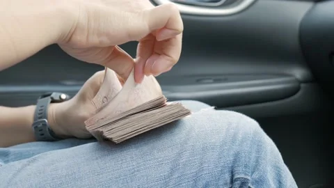 Hands counting money in the car. Stock Footage 165681881