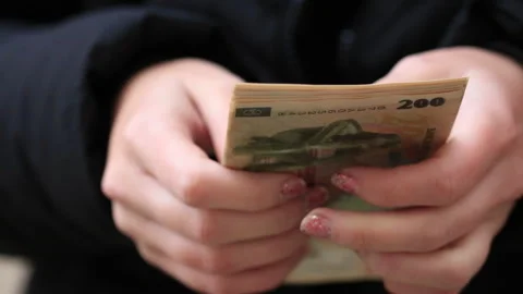 Hands counting Romanian LEI banknotes for cash payment Stock Footage 343782093