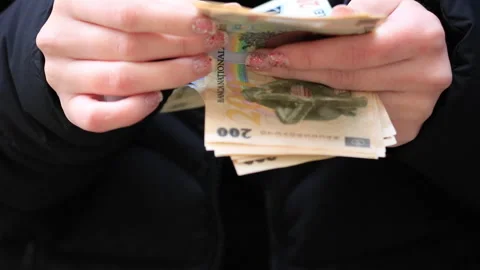 Hands counting Romanian LEI banknotes for cash payment Stock Footage 343782492