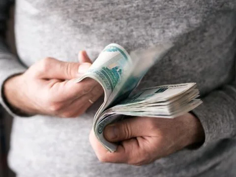 Hands counting rubles 스톡 사진