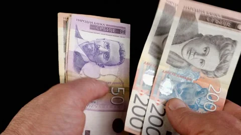 Hands counting stack cash Serbian dinar different cost, recalculation banknotes. Stock Footage 201530437