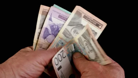 Hands counting stack cash Serbian dinar. Stock Footage 202075480
