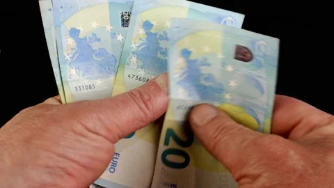 Hands counting stack cash twenty euro bills, recalculation banknotes. Stock Footage 201531525