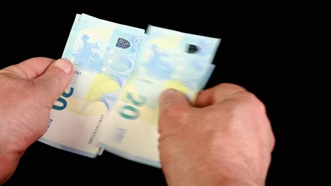 Hands counting stack cash twenty euro bills, recalculation banknotes. Stock Footage 201624583