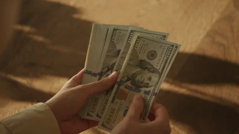 Hands Counting Stack of Hundred Dollar Bills Stock Footage 280296733