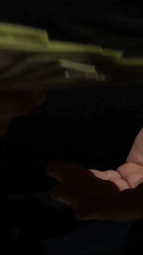Hands Counting Stack Of US Dollar Bills On Black Background Stock Footage 339971864