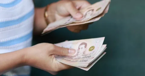 Hands counting Thai baht banknotes, finance and money, cash, savings, budge.. Stock Footage 341088947