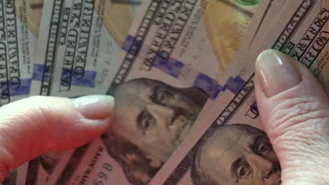 Hands Counting US Dollar Bills in Slow Motion, Close-Up Stock Footage 323622295