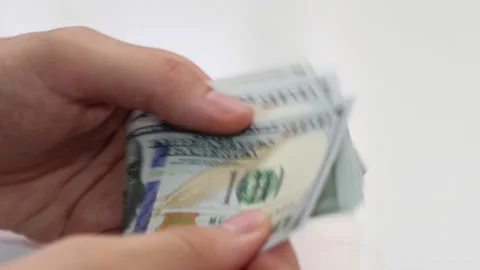 Hands counting US Dollar Stock Footage 134086731