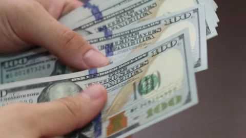 Hands counting US Dollar. Stock Footage 134087285