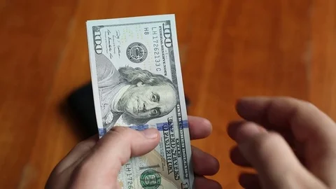 Hands counting the US dollars  Stock Footage 72242384