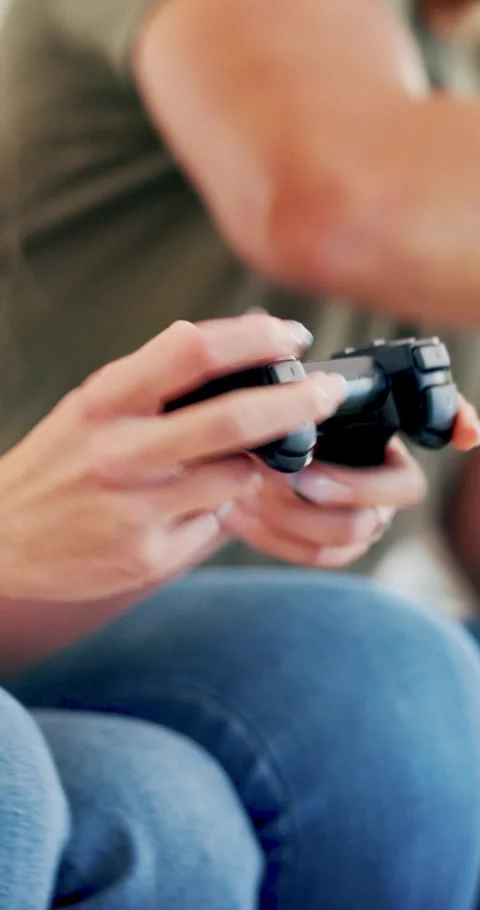 Hands, couple and playing with controller, video game and tech for virtual Stock Footage 336853554