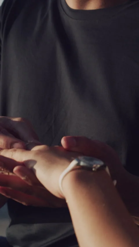 Hands, couple and proposal with engagement ring for love, romantic gesture and Stock Footage 329768579