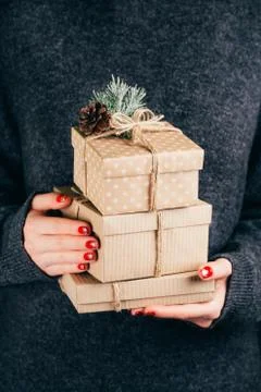 Hands with craft gift boxes Stock Photos