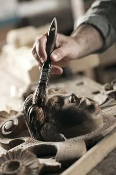Hands of a craftsman Stock Photos