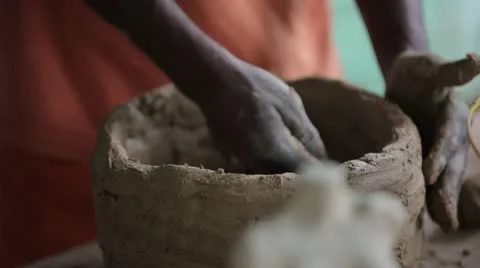 Hands creating a clay pot Stock Footage 17225647