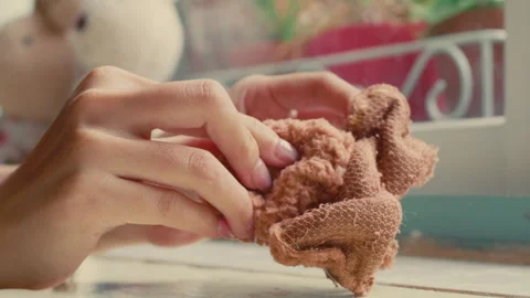 Hands Creating a Customizable Bear at Build-A-Bear Workshop - Close Up Stock Footage 296279927