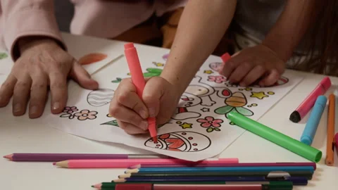Hands of Creative Child Coloring Easter Egg Drawing Stock Footage 327894042