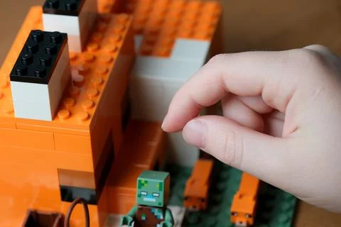 Hands-on creativity with building blocks and playful characters 스톡 사진