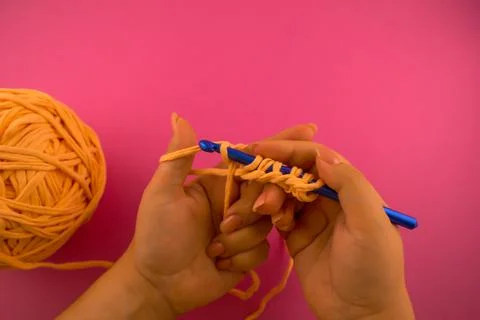 Hands with crochet hook Stock Photos