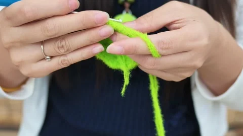 Hands Crocheting Bright Green Yarn with Hook Needle Video stock 346288577
