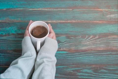 Hands with a cup of coffee Stock Photos