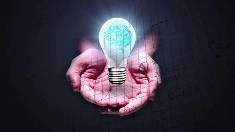 Hands cupping glowing bulb brain in grid, bulb brightening animating math over Stock Footage 330379833