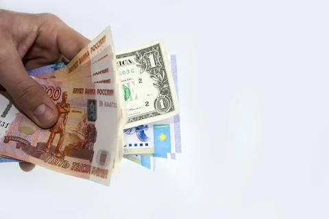 In the hands of the currency of different countries, the ruble, the dollar Stock Photos