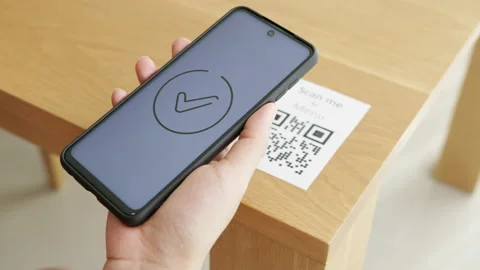 Hand's customer scan QR code for online menu service at table in restaurant Stock Footage 146264592