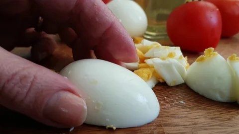 Hands cut boiled egg Stock Footage 93487523
