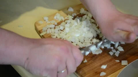 Hands cut onion with knife on board. healthy food prepare Stock Footage 17973485