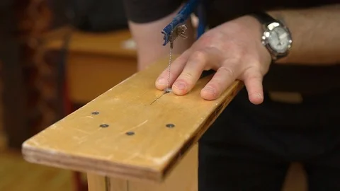 Hands cut plexiglass windows for passenger aircraft model Stock Footage 127113348