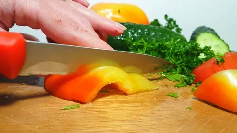 Hands cut salad, healthy food, healthy food, vegetables, vegetarianism, cucumber Stock Footage