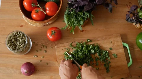 Hands cut salad on top Stock Footage 112135543