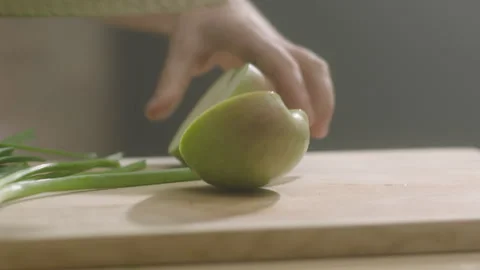 Hands cuts apples in half Stock Footage 198702183