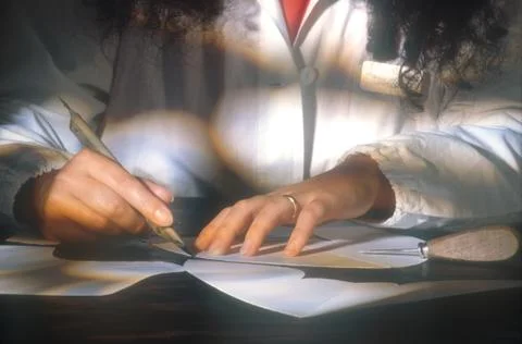 Hands with cutter at work Stock Photos