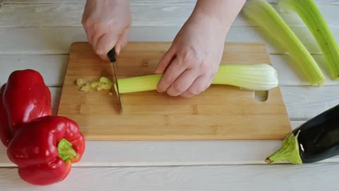 Hands cutting celery close up ProRes 4K Stock Footage 164206267