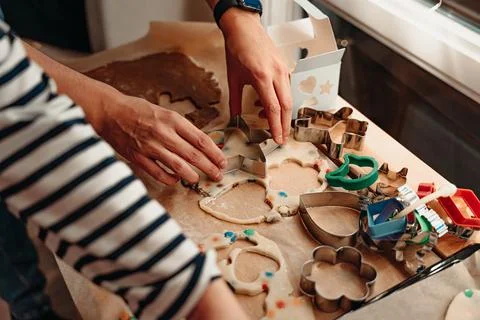 Hands Cutting Cookie Shapes from Rolled Dough Stock Photos