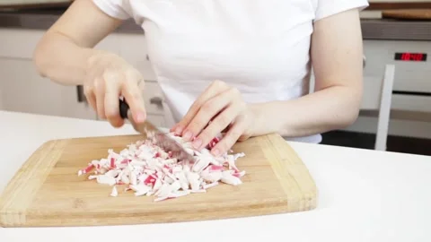 Hands cutting crab meat, close-up of a culinary process, natural and fresh .. Stock Footage 301948707