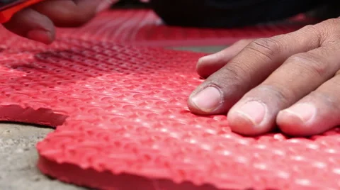 Hands cutting EVA foam Stock Footage 67232518