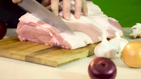 Hands cutting fresh meat Stock Footage 61785571